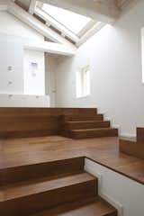 Staircase and Wood Railing Stair  Photo 18 of 22 in Renovation of a Farmhouse by EXiT architetti associati