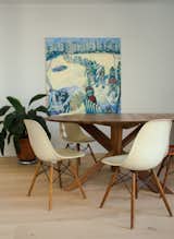 Restored original Charles Eames chairs furnish the dining room