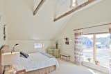 Master Bedroom with vaulted ceilings and large west facing windows