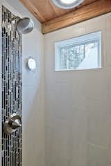 custom tiled shower  Photo 15 of 31 in Timber Frame Renovation by Mottram Architecture