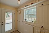 Hallway Bead board entryway  Photo 15 of 35 in The Red Barn Home by Mottram Architecture