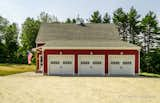 Attached wing of the barn acts as a 3 car garage