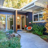 Exterior, Mid-Century Building Type, Wood Siding Material, Metal Siding Material, and Flat RoofLine  Photo 1 of 16 in Mid-Century Modern Ranch in Denver's Sought-After Krisana Park by Conrad Steller