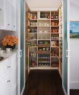With deep pantry shelving it's often difficult to tell what is at the back of the shelf. Spices and ingredients can go unnoticed and you may re-purchase items you already have. Adding a pull-out cabinet and organizer allows you to see the full length of the storage space and access all of your organized spices and canned goods, so the ingredients you need are never out of sight and out of mind. A section of pantry shelves with adjustable heights allows you to store all of your favorite boxed foods, whatever the size, from bulky cereal boxes to cake mixes. This design has full line bore, meaning that the shelves can be fully adjusted up and down the entire height of the pantry to easily suit your needs. Wicker baskets are great for fruits, vegetables and other perishables in the pantry. The baskets breathe to help keep those delicious ingredients fresh and ripe. Use them in a modern or traditional design to add some warmth and charm to your pantry for a homey feeling.
