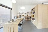 Office, Bookcase, Chair, Lamps, Desk, Concrete Floor, Storage, and Shelves Office Dones del 36  Photo 2 of 9 in Office Dones del 36 by ZEST architecture