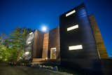 Exterior, Shed RoofLine, Metal Roof Material, Metal Siding Material, Prefab Building Type, and Wood Siding Material Main Entry   Photo 5 of 6 in Quarterdeck Beach Lofts by Nicholas Fudge Architects