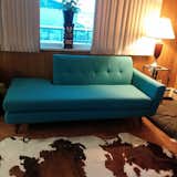 My new couch from Joybird!  Paired it with a brown and white cowhide rug.