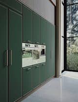 With a more industrial appeal, the green and copper variant features interiors in canaletto walnut, metal profiles in copper finish and customized handles