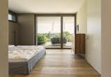 Bedroom, Bed, Storage, and Light Hardwood Floor  Photo 13 of 13 in Object 340 - combination of quality and comfort by meier architekten zurich