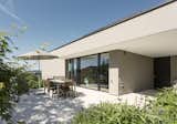 Outdoor, Small Patio, Porch, Deck, Concrete Patio, Porch, Deck, Stone Patio, Porch, Deck, and Side Yard  Photo 5 of 13 in Object 340 - combination of quality and comfort by meier architekten zurich