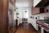 Cabinetry by HenryBuilt, Dimensional tile backsplash by Heath Ceramics, Wolf range, Sub-zero refrigerator