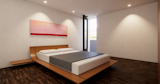 Guest bedroom with exterior access to the second level patio. 