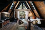 Living, Chair, Sofa, Coffee Tables, End Tables, Ceiling, Pendant, Dark Hardwood, and Wood Burning  Living Pendant Coffee Tables Ceiling Dark Hardwood Photos from Big Bear A-Frame Receives Boho Eclectic Transformation