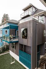 An expansive addition to this Seattle home includes a series of new decks on multiple levels with amazing views of Lake Washington