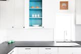 Pops of color in unexpected places in an otherwise neutral kitchen. 
