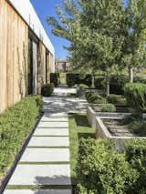 Secondary entrance with kitchen garden