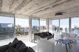 Living Room, Sofa, Ceiling Lighting, Cement Tile Floor, and Coffee Tables Living room  Photo 6 of 20 in Nautilus by MARTIN GOMEZ