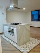 Kitchen, Dishwasher, Concrete Counter, and Ceiling Lighting Kitchen  Photo 2 of 11 in Bogota downtown