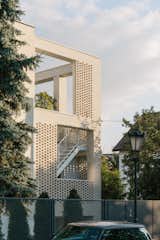 House for W / exterior / brick facade / steel / external staircase