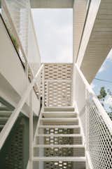 House for W / exterior / brick facade / steel / external staircase
