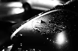 About This Abstract / Still Life Photo:

Harley in the Rain is a black and white photograph of the tank of a Harley Davidson Motorcycle in the streetlights of a rainy night in Ocean City Maryland.

Title: Harley in the Rain
Photographer: Melissa Fague
Genre: Abstract Photography
Item ID#: ABS-6027

This still life / abstract photograph is one of many available for purchase through www.pipafineart.com. You have your chose of size and print materials. All of our still life / abstract  pictures are printed on high quality materials and the highest quality ink for longevity. Each photo print is also coated with a soft luster finish. If you need assistance we are always available; please contact us with any questions.