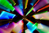 About This Abstract / Still Life Photo:

Zoomed CD's is an abstract photograph that was created using a long shutter speed and zooming the lens out as the shutter remained open to streak the colors.

Title: Zoomed CDs
Photographer: Melissa Fague
Genre: Abstract Photography
Item ID#: ABS-6009

This still life / abstract photograph is one of many available for purchase through www.pipafineart.com. You have your chose of size and print materials. All of our still life / abstract  pictures are printed on high quality materials and the highest quality ink for longevity. Each photo print is also coated with a soft luster finish. If you need assistance we are always available; please contact us with any questions.