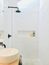Light pours into the open shower.
