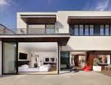 Opening the space between inside and out creates a seamless transition for any party or to simply enjoy the perfect spring afternoon.  Photo 8 of 17 in North Dallas by Mary Anne Smiley