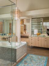 Bath Room, Engineered Quartz Counter, Accent Lighting, Recessed Lighting, Freestanding Tub, Pendant Lighting, Two Piece Toilet, Undermount Tub, Ceiling Lighting, Glass Tile Wall, Vessel Sink, Porcelain Tile Floor, and Enclosed Shower  Photo 17 of 52 in Modern Frontier by Mary Anne Smiley