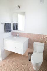 Erin Adams tile adds interest and color to a minimal bathroom