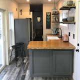 A view of the kitchen featuring bowling alley countertops at Appalachian Container Cabin