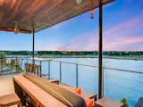 Covered patio includes more lake views and bar seating