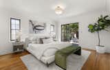 Spacious primary suite with access to the patio