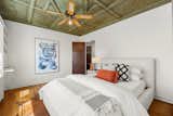 Bedroom with coffered ceiling detail