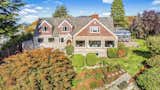 Perched on a hill above the Salish Sea in South Puget Sound lies this exceptional architectural jewel w/ contemporary features. Enter your gated .50 acre property into an incredibly functional floor plan w/ coved ceilings, custom windows, hardwood flooring and sweeping mountain & water views from every room. The home was built in 1938 with stones from the Stanford White-designed Old Tacoma Hotel.