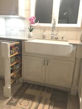 Wooden turned legs with storage behind. Spices & herbes storage