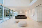 Living Room, Sofa, Ceiling Lighting, and Limestone Floor  Photos from House P+G
