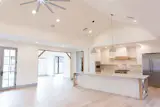 Layers of light, warm finishes and farmhouse details make a big impact!
