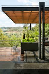 Outdoor, Rooftop, Shrubs, Decking Patio, Porch, Deck, Trees, and Metal Fences, Wall  Photo 2 of 11 in Villa Jardín by ASP Arquitectura Sergio Portillo