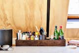 Bar supplies by Art in the Age. Detail of original beam reveal shown painted with matte black milk paint.