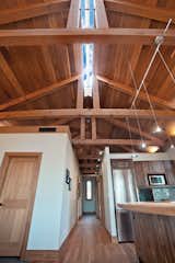 Inside the Jewel, the ridge skylight is the crowning detail, allowing natural light throughout the length of the home. 
