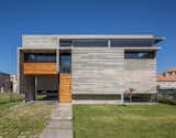 Exterior, House Building Type, Concrete Siding Material, Wood Siding Material, and Glass Siding Material  Photos from Berazategui House