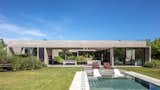Outdoor, Wood Patio, Porch, Deck, Infinity Pools, Tubs, Shower, Swimming Pools, Tubs, Shower, Grass, Gardens, Back Yard, and Concrete Fences, Wall  Photo 6 of 48 in Pilará  House by Besonías Almeida arquitectos