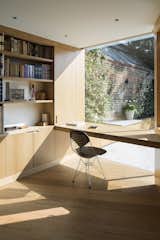 Office, Light Hardwood Floor, Desk, Chair, Shelves, Study Room Type, Bookcase, and Storage Reading Room by Studio Carver  Photo 5 of 6 in 6 Ways to Turn Your Home Office Into a Distraction-Free Zone from The Reading Room