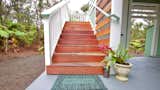 Outdoor, Small Patio, Porch, Deck, Side Yard, Walkways, Trees, and Concrete Patio, Porch, Deck Welcome to the treehouse entrance.  Photo 9 of 11 in Romantic Tree Cottage in the Hawaiian Rainforest by Shannon Victoria