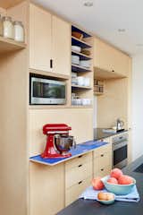 pull-out laminate work surface at appliance garage