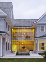 The Hamptons - Thermally broken steel window wall and hinged door.  Engineered to the projects high wind load pressures.  Custom fixation and brackets were required to fasten the window to the floating second floor.