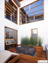 Dynamic fineline common mullion wood windows with integrated out-swing awning windows.  Manhattan Beach - CA