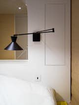 Bedroom, Bench, Storage, Bed, and Wall Lighting  Photo 8 of 14 in Urban Cocoon in Paris by Nathalie Eldan Architecture