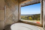 Master bath with panoramic vineyard views